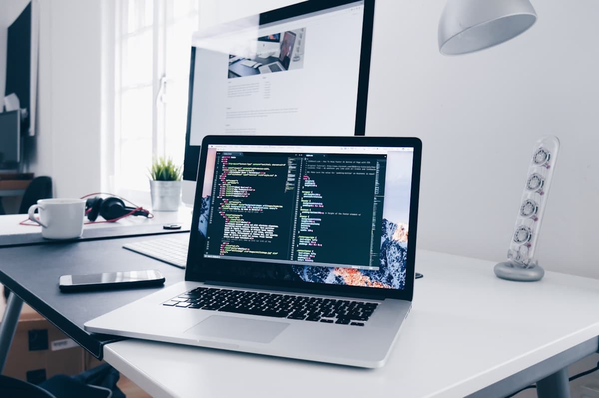 Development workspace with code on screen